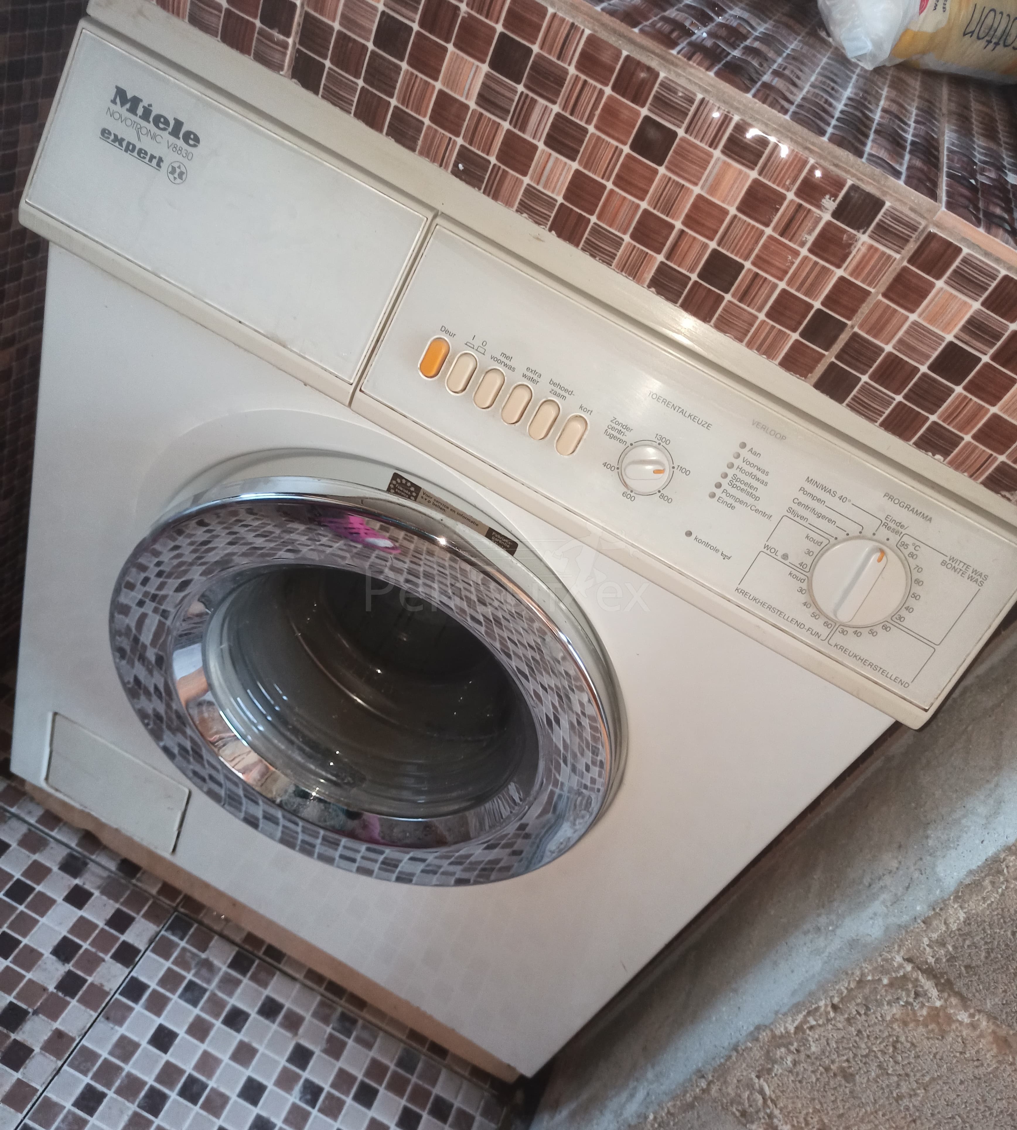 В стиральную машину попал посторонний предмет – как достать?